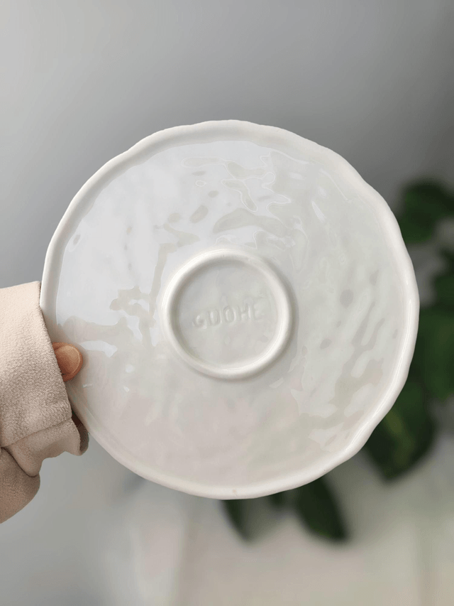 Tasse à café et assiette en porcelaine oranges