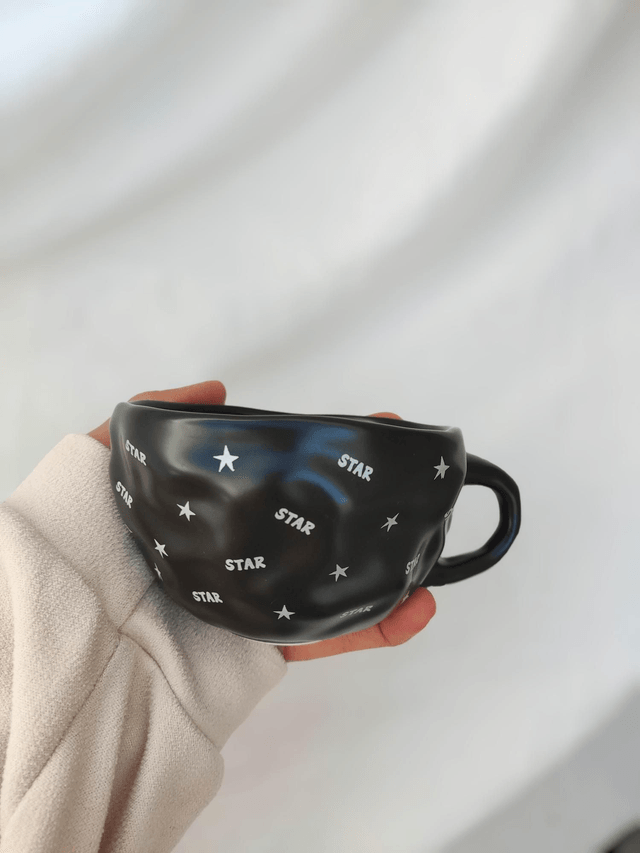 Tasse à café et soucoupe étoiles noir