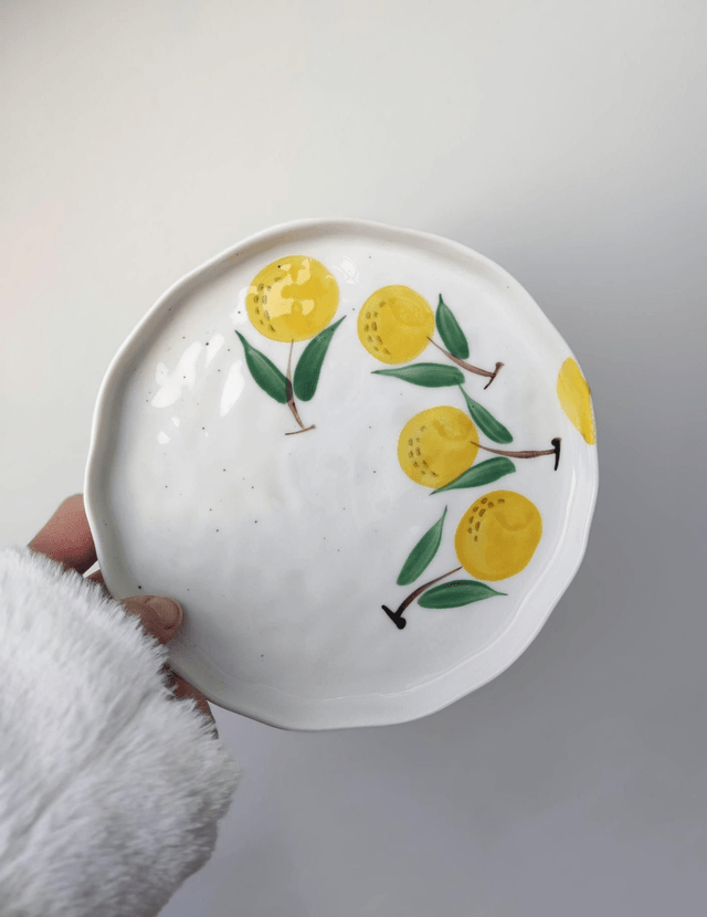 Tasse à café et assiette en porcelaine citrons